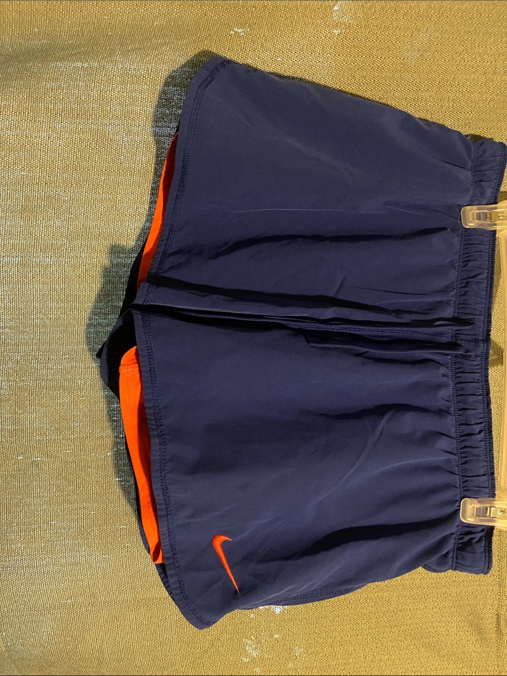 Nike Women’s Navy Blue Athletic Shorts with Orange Accent